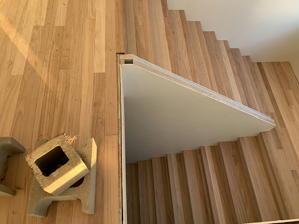 past installation of timber flooring around staircase